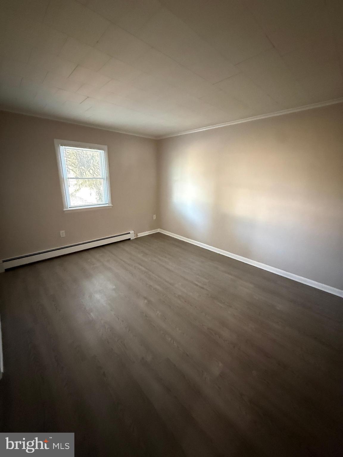 304 Walnut Street, Unit B Waynesboro, PA 17268 - Photo 12 of 17 an empty room with a window