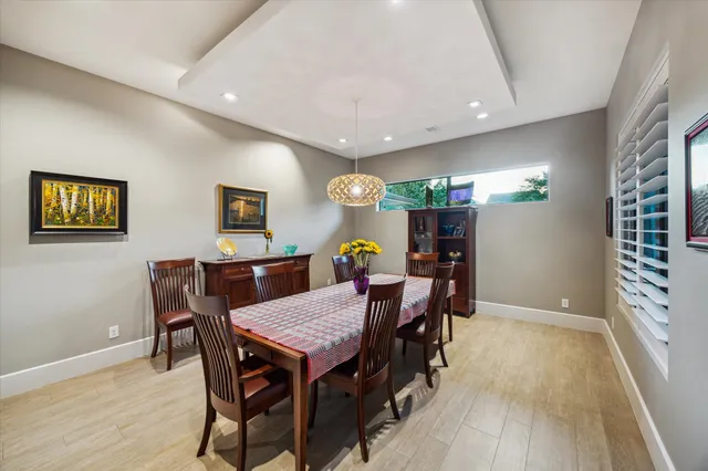 a view of a dining room with furniture