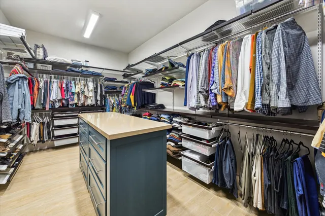 a view of a storage with a table and chairs