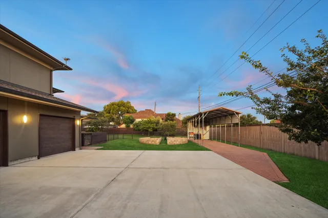 a view of a backyard with a garden