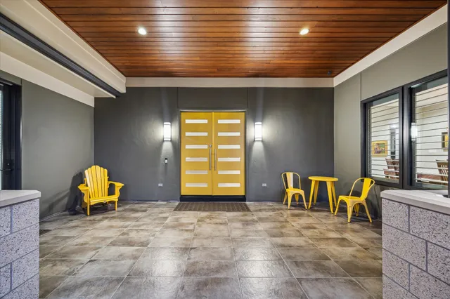a view of a swimming pool with a lounge chairs