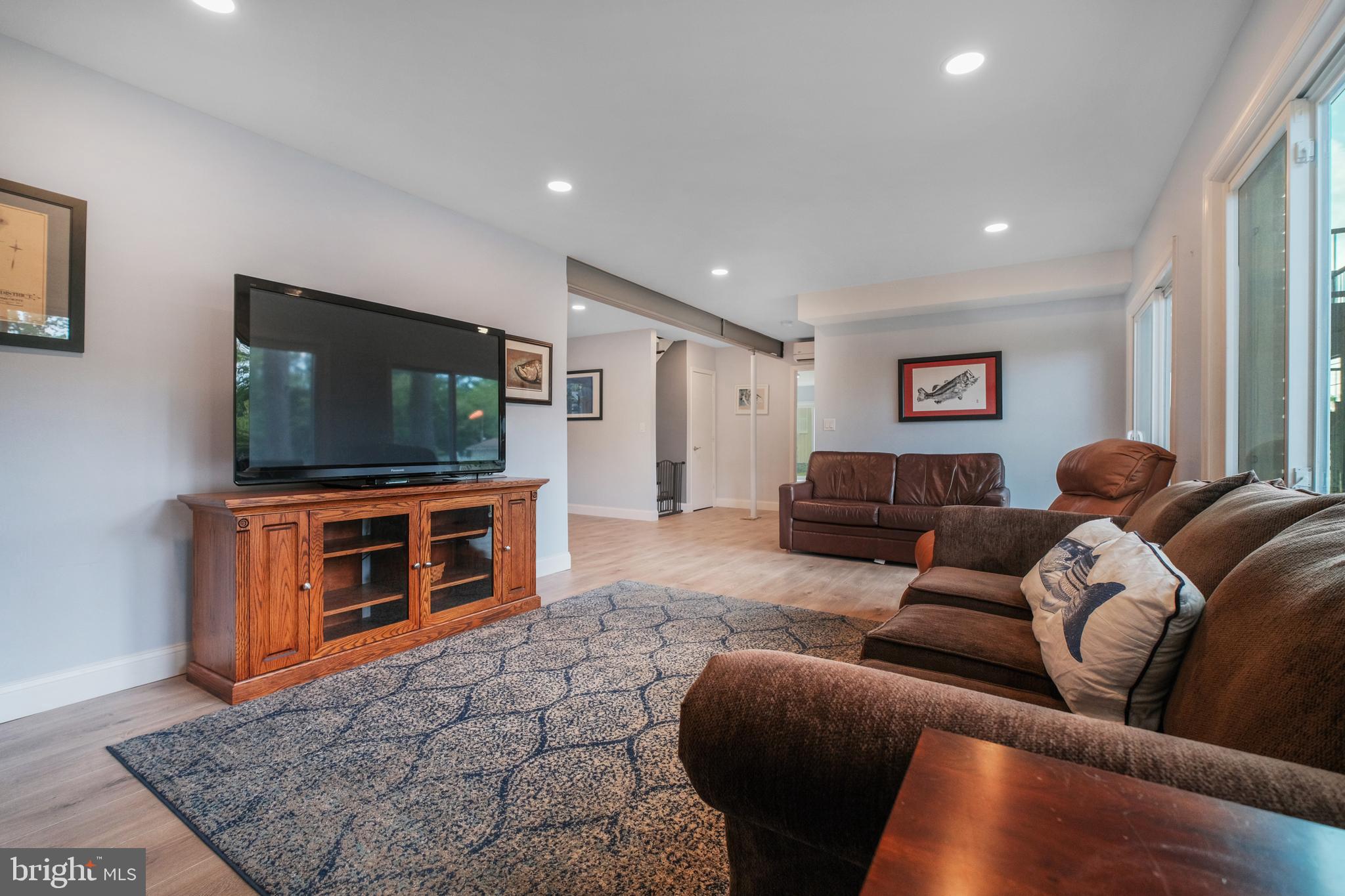 819 Elm Drive West River, MD 20778 - Photo 22 of 39 a living room with furniture and a flat screen tv