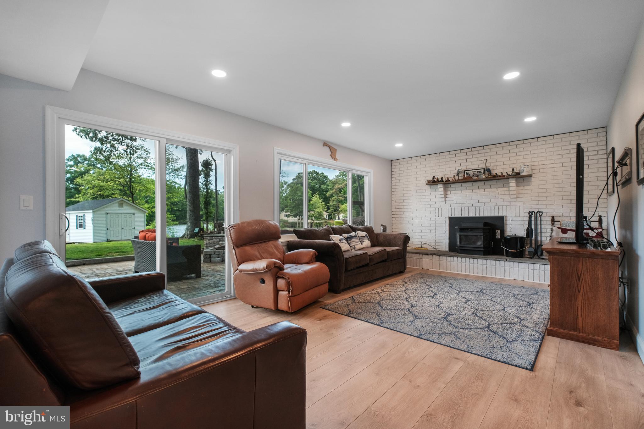 819 Elm Drive West River, MD 20778 - Photo 23 of 39 a living room with furniture and a fireplace