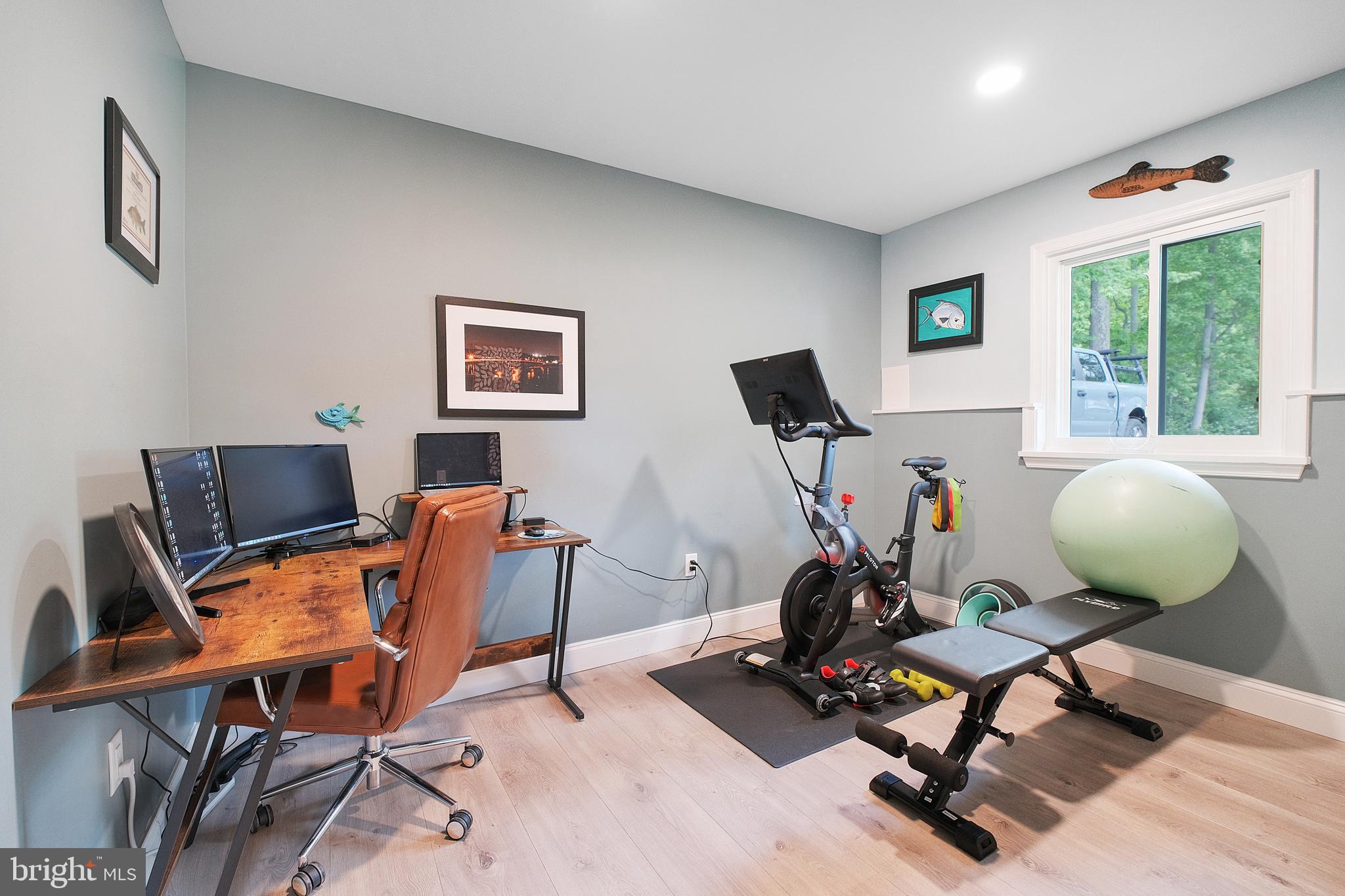 819 Elm Drive West River, MD 20778 - Photo 26 of 39 a view of a workspace with furniture and a window