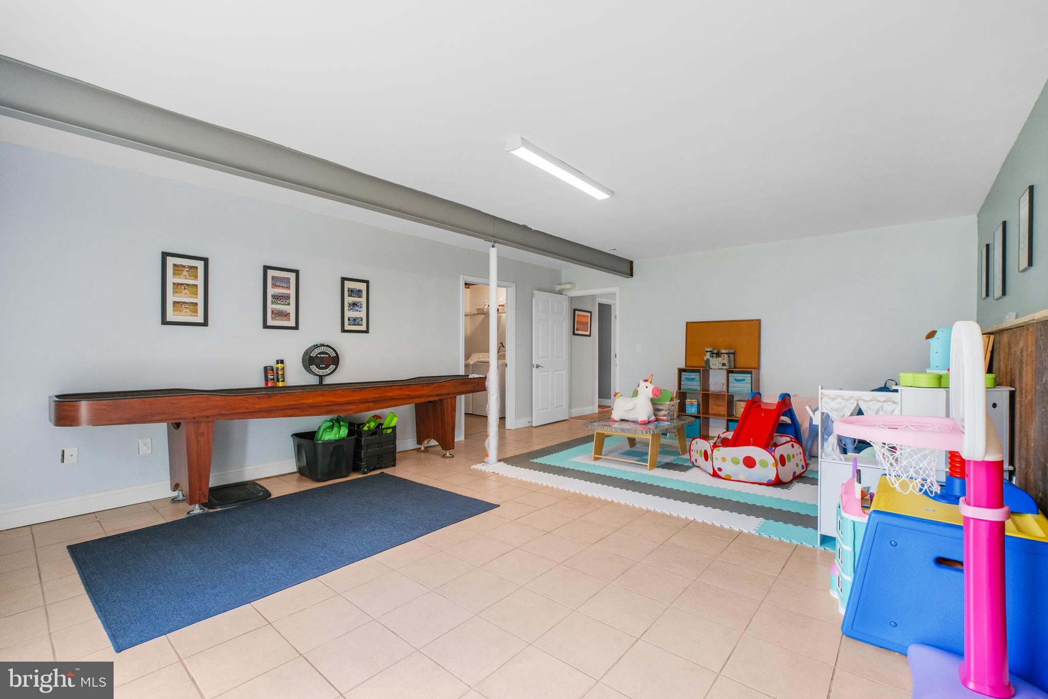 819 Elm Drive West River, MD 20778 - Photo 27 of 39 a hallway with toys and toys