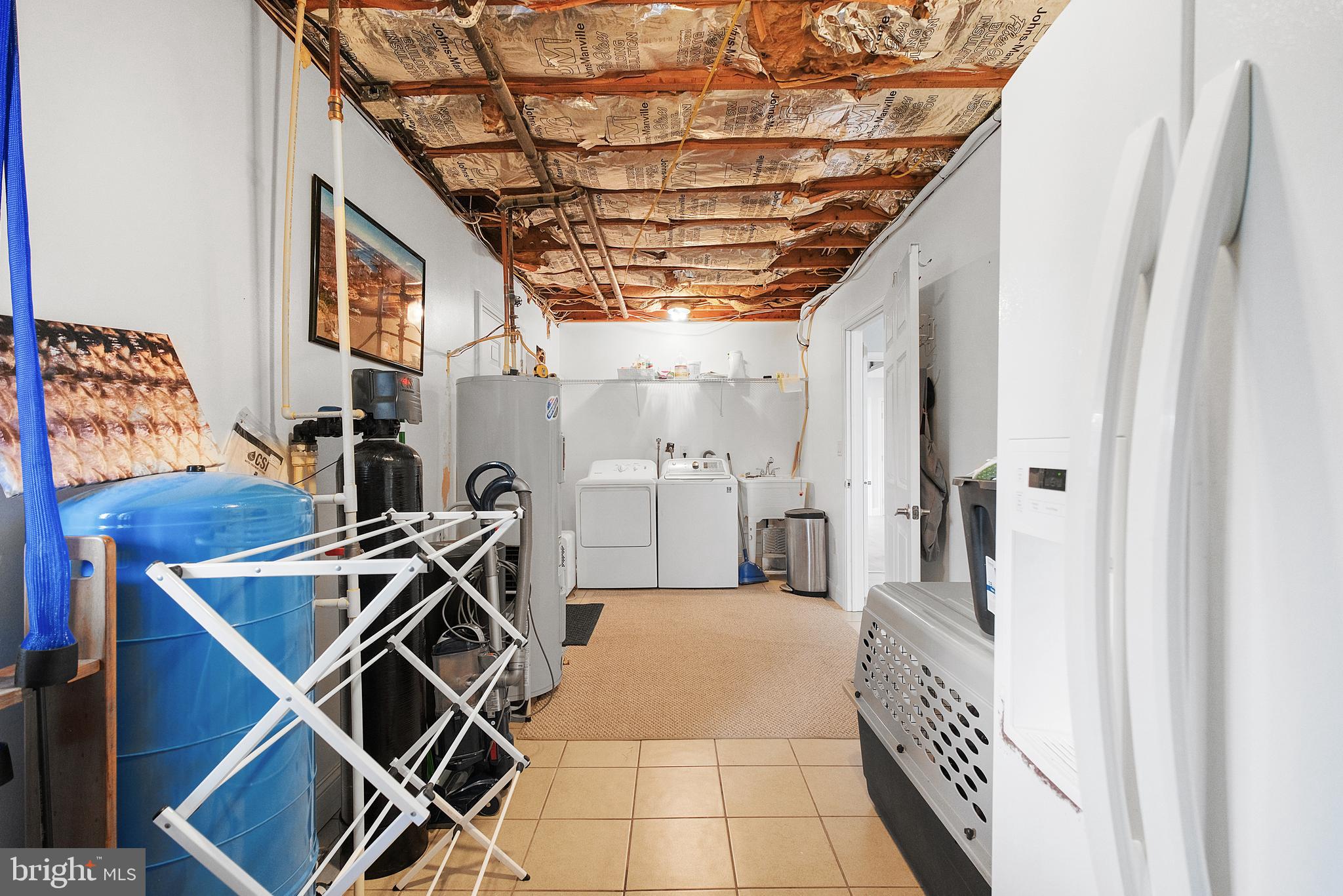 819 Elm Drive West River, MD 20778 - Photo 28 of 39 a view of a room with wooden floor and windows