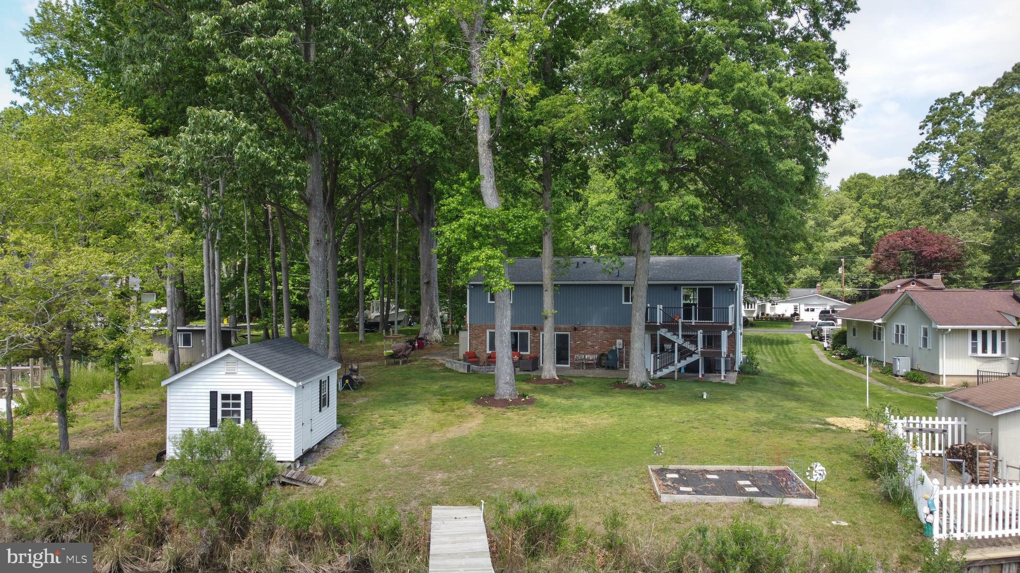 819 Elm Drive West River, MD 20778 - Photo 35 of 39 a front view of a house with garden