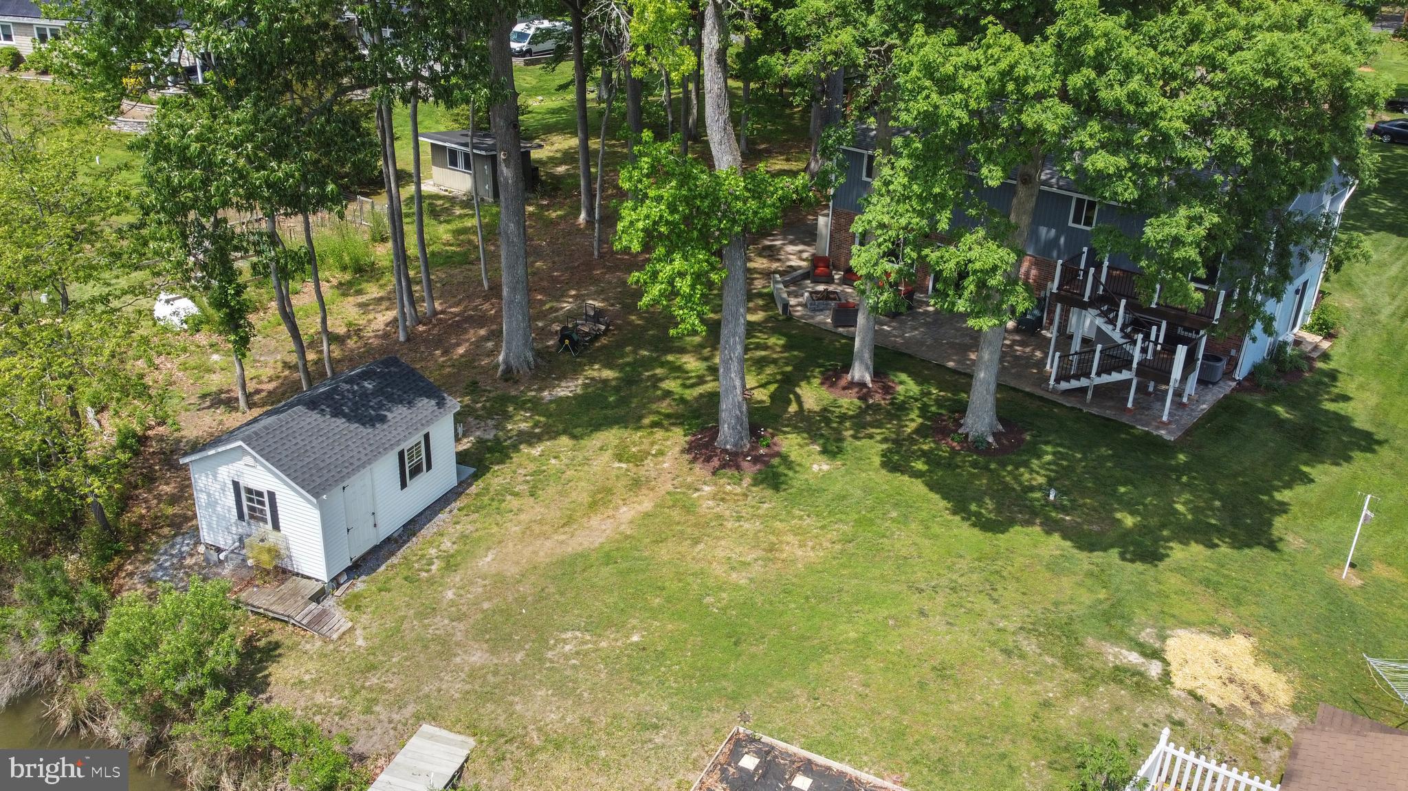 819 Elm Drive West River, MD 20778 - Photo 36 of 39 a backyard of a house with outdoor seating