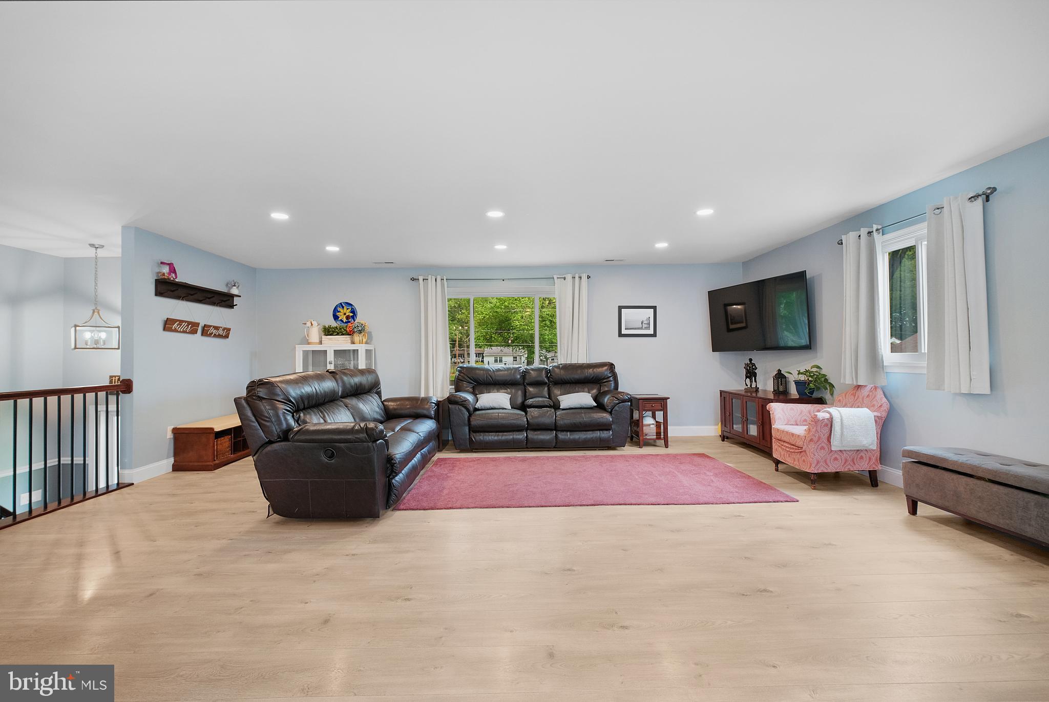 819 Elm Drive West River, MD 20778 - Photo 7 of 39 a living room with furniture a flat screen tv and a window
