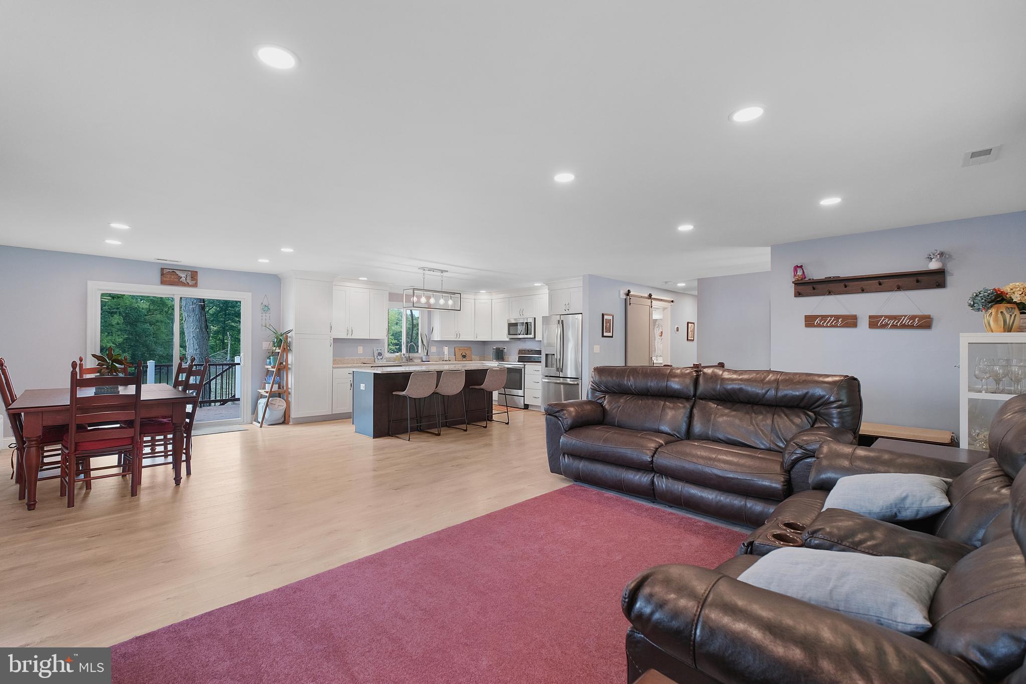 819 Elm Drive West River, MD 20778 - Photo 8 of 39 a living room with furniture and a table