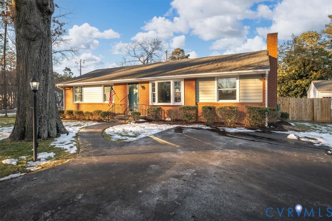 Brick home, paved driveway