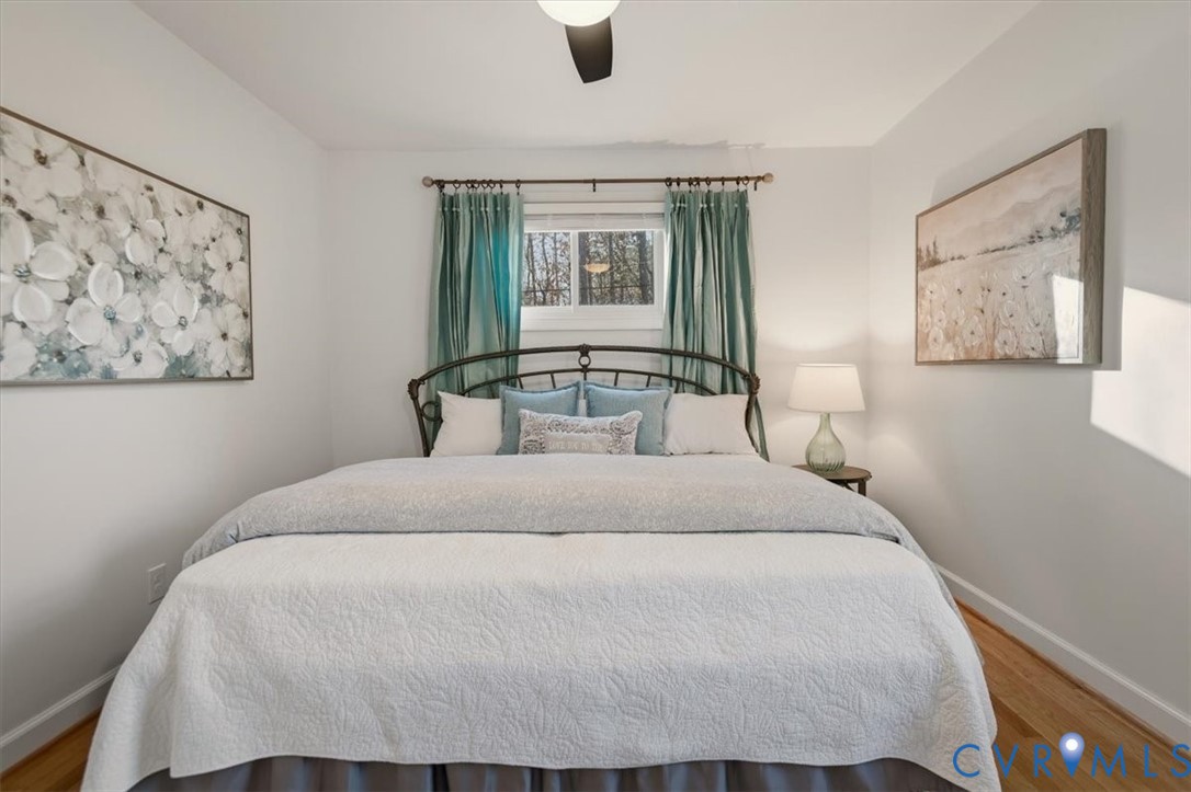 2720 Omega Road Henrico, VA 23228 - Photo 35 of 45 Bedroom featuring wood floors and a ceiling fan