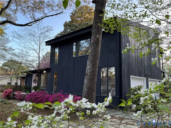 a backyard of a house with lots of green space