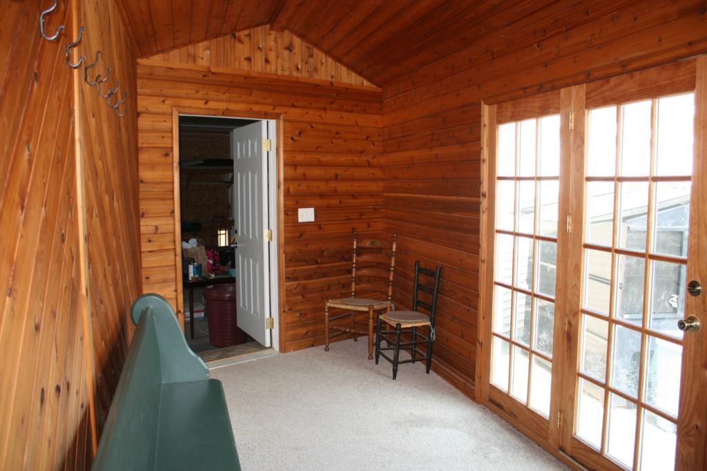 393 College Road Greene, ME 04236 - Photo 24 of 35 MUD ROOM SEPERATES THE GARAGE TO...