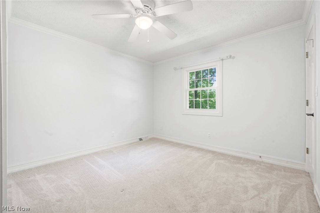3871 Greentree Road Stow, OH 44224 - Photo 31 of 50 Bright interior space featuring white walls and light-toned carpeting