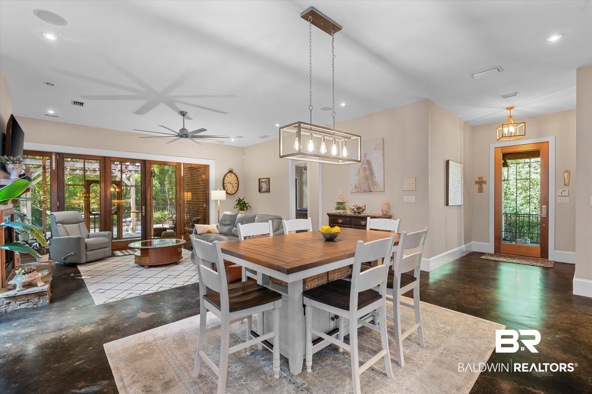 3400 Rue Royal Mobile, AL 36693 - Photo 3 of 33 Dining area featuring finished concrete floors, recessed lighting, and ceiling fan