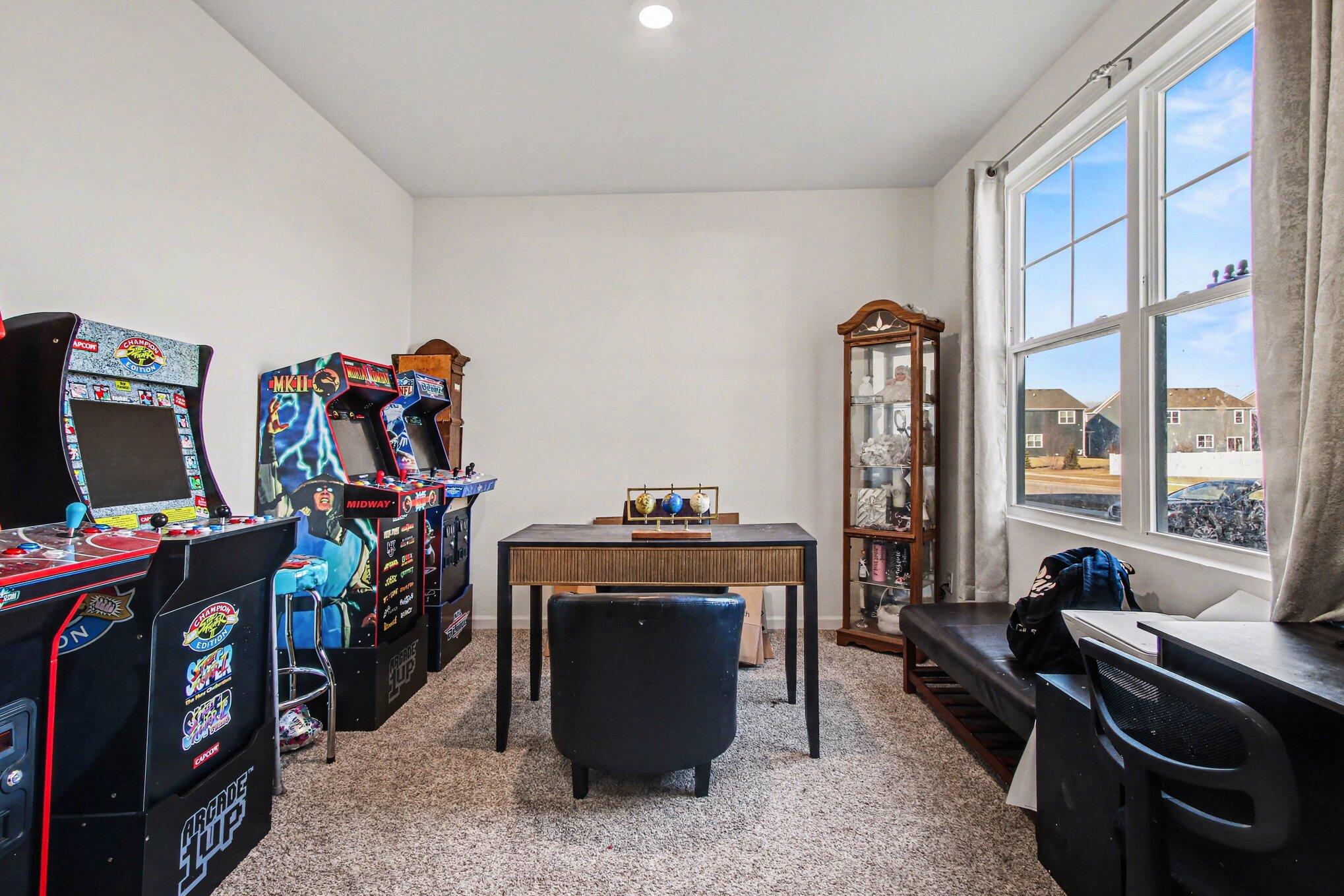 10560 Azalea Drive Crown Point, IN 46307 - Photo 11 of 26 a view of a room with workspace and a window