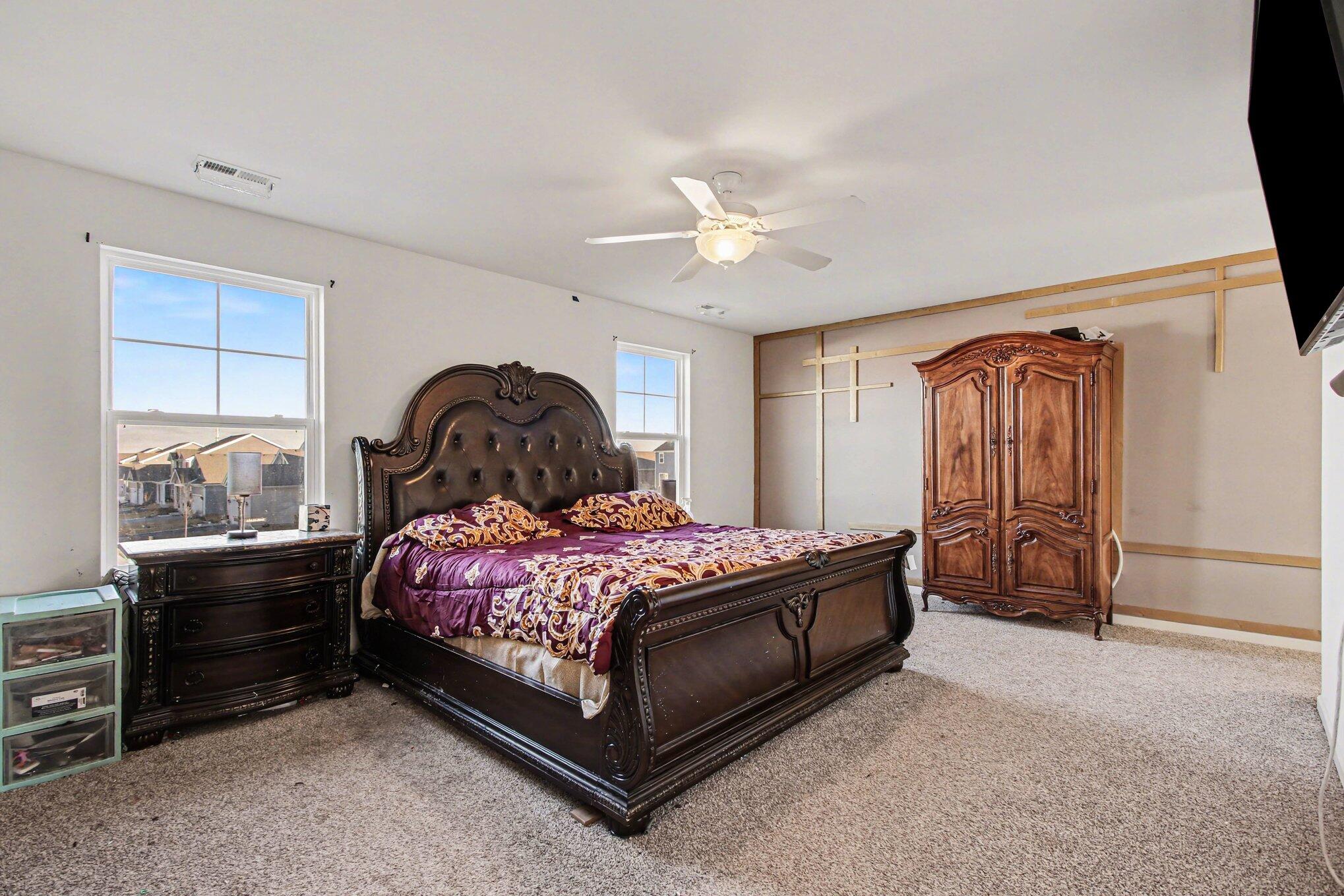 10560 Azalea Drive Crown Point, IN 46307 - Photo 15 of 26 a bedroom with a bed and a window
