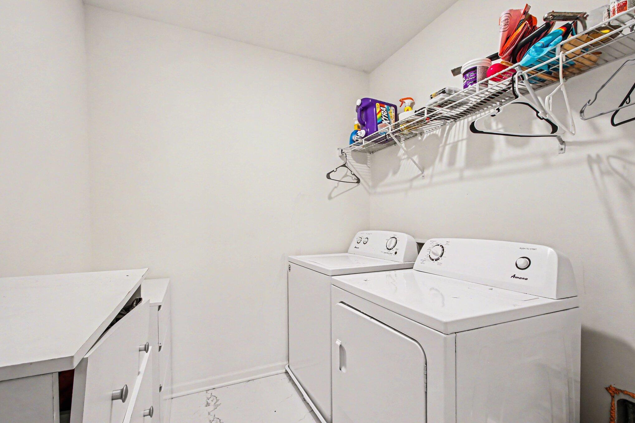 10560 Azalea Drive Crown Point, IN 46307 - Photo 22 of 26 a utility room with dryer and washer