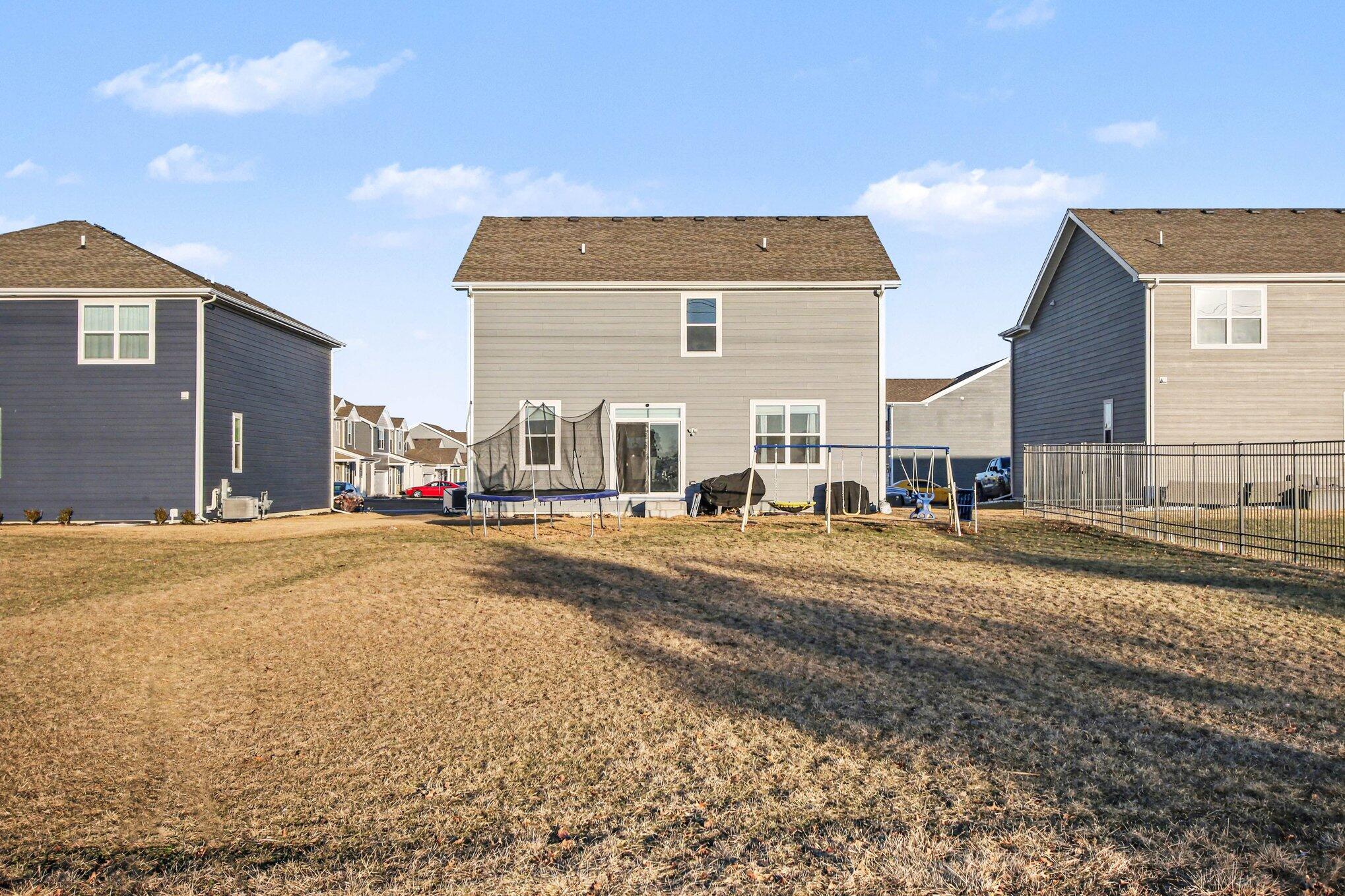 10560 Azalea Drive Crown Point, IN 46307 - Photo 26 of 26 a view of a street with a building
