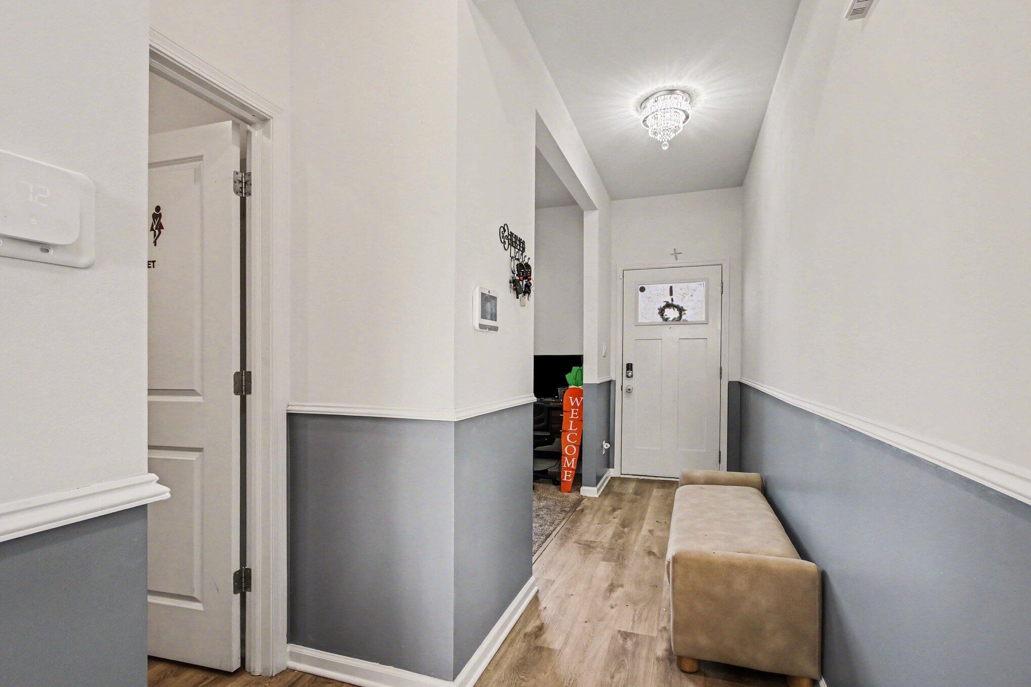 10560 Azalea Drive Crown Point, IN 46307 - Photo 4 of 26 a view of walk in closet with clothes and shoes
