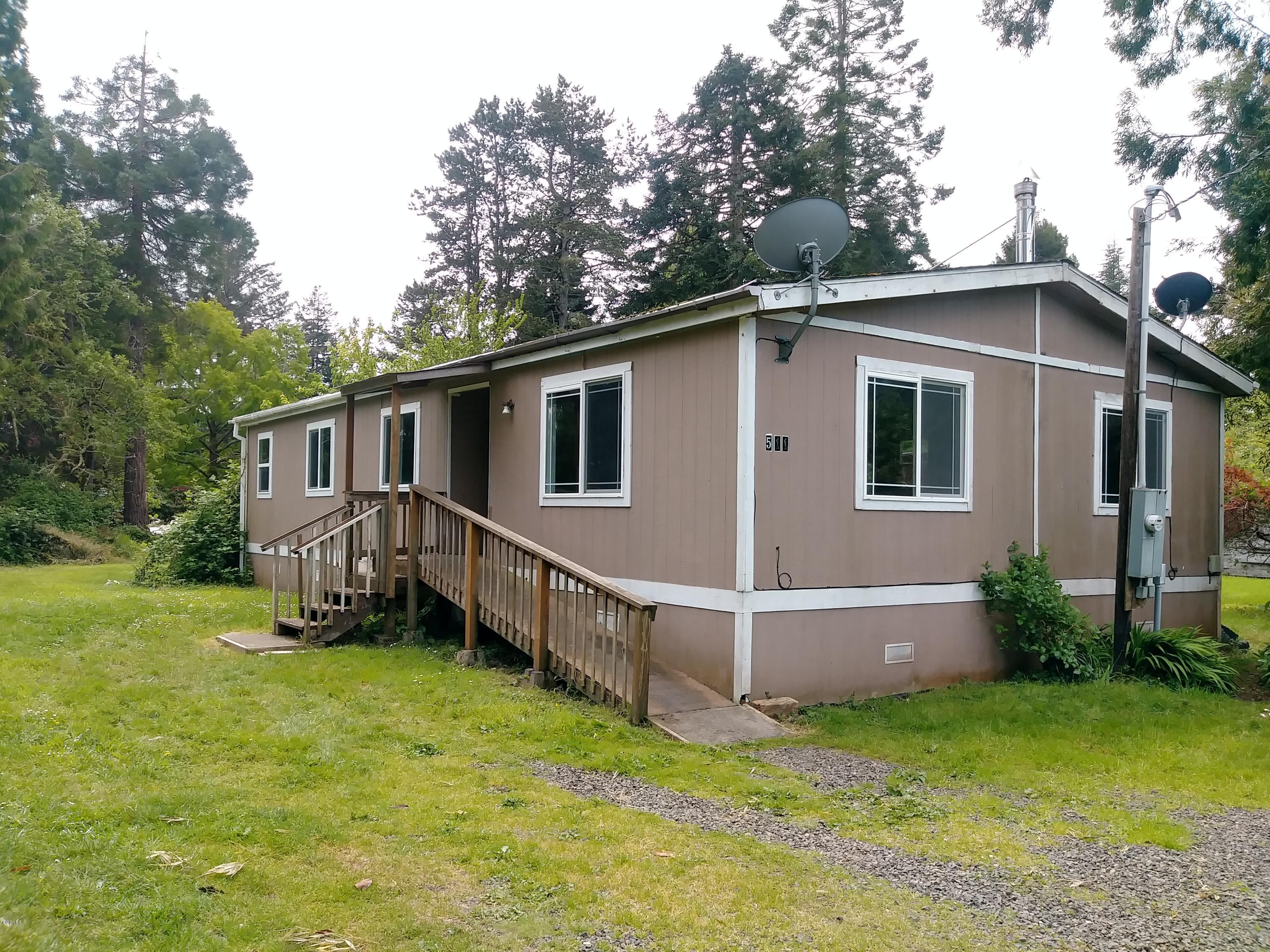 511 Southeast Moffitt Road Waldport, OR 97394 - Photo 1 of 37 Side View