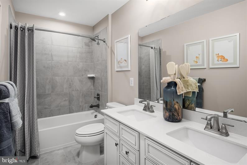 334 Ruffian Rd Camp Hill Camp Hill, PA 17011 - Photo 20 of 24 a bathroom with a granite countertop sink a toilet and shower