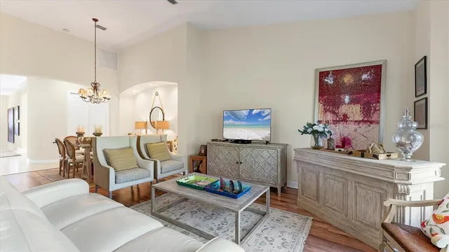 a kitchen with a refrigerator and a stove top oven