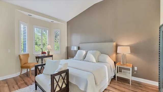 a view of a hallway with closet and a livingroom view