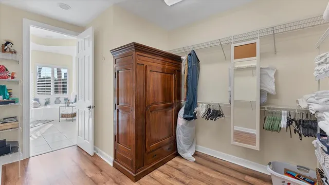 a bathroom with a bathtub and shower