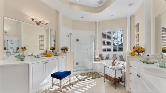 a bathroom with a sink vanity mirror and toilet