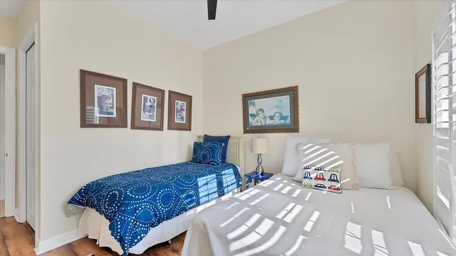 an aerial view of a residential houses with outdoor space