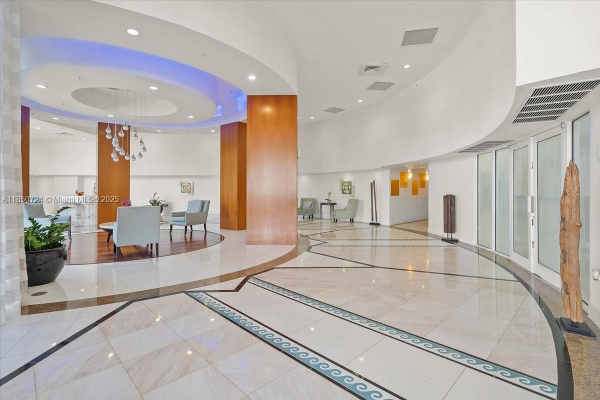 6301 Collins Avenue, Unit 2705 Miami Beach, FL 33141 - Photo 21 of 41 a view of a living room and a living room