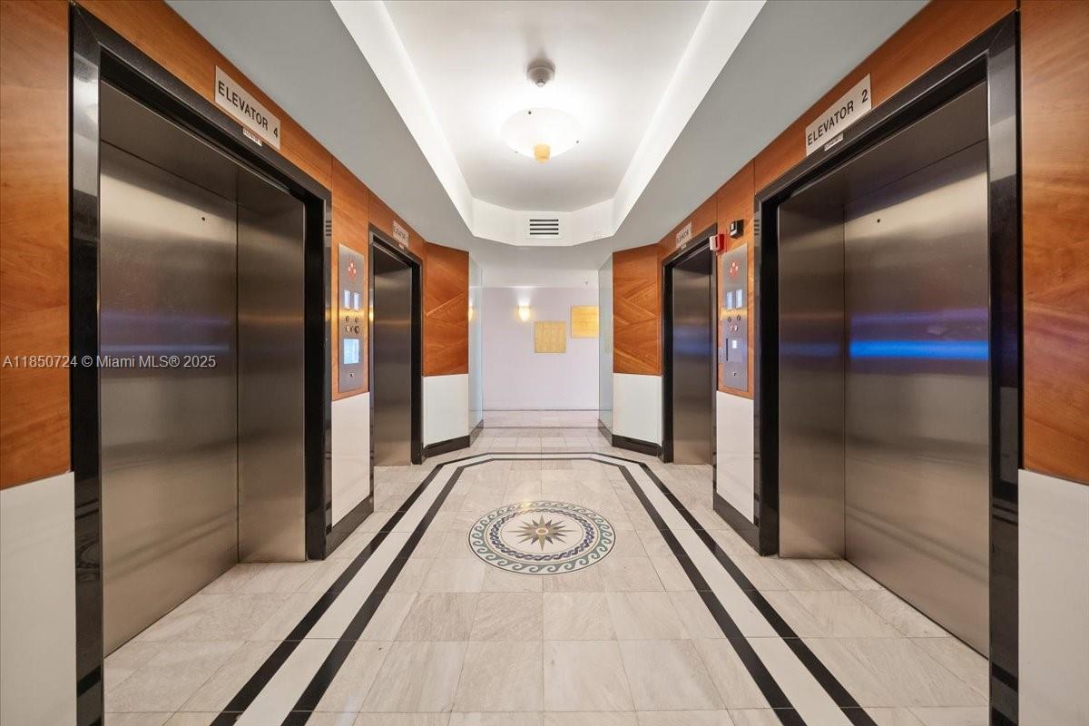 6301 Collins Avenue, Unit 2705 Miami Beach, FL 33141 - Photo 25 of 41 a view of entryway with a hallway