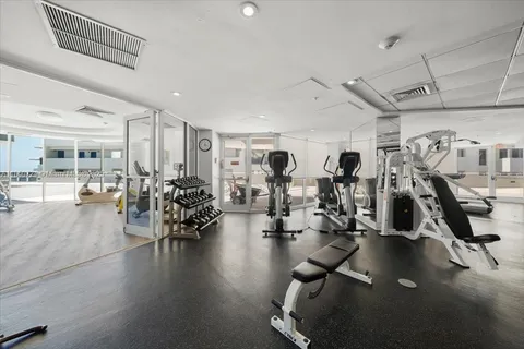 a view of a room with gym equipment
