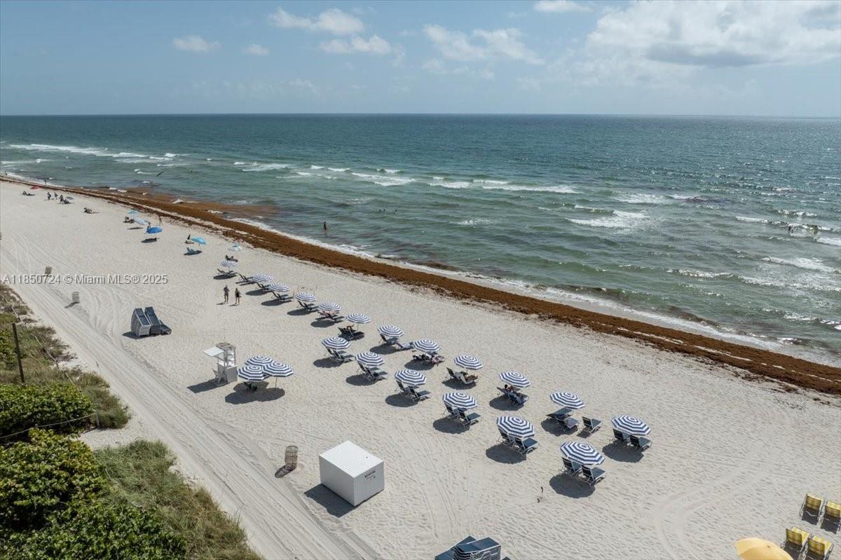 6301 Collins Avenue, Unit 2705 Miami Beach, FL 33141 - Photo 39 of 41 a view of an ocean from a balcony