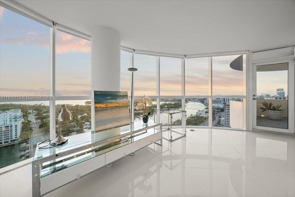 6301 Collins Avenue, Unit 2705 Miami Beach, FL 33141 - Photo 5 of 41 a building with pool view