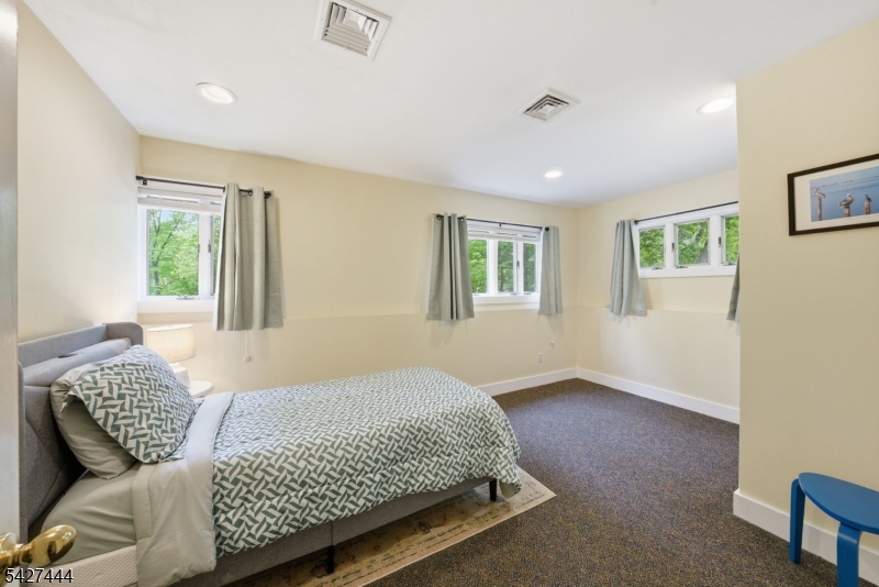 156 Kingsland Road Boonton, NJ 07005 - Photo 20 of 38 a bedroom with a bed and wooden floor
