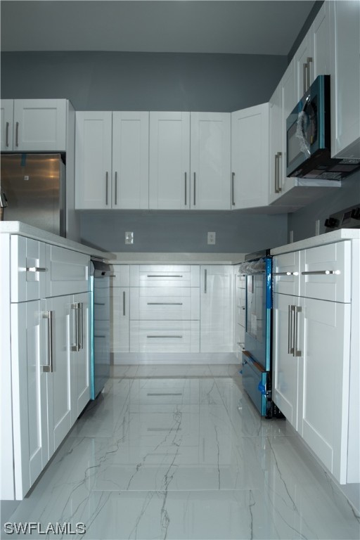 3718 41st Street Southwest Lehigh Acres, FL 33976 - Photo 13 of 28 a view of utility room