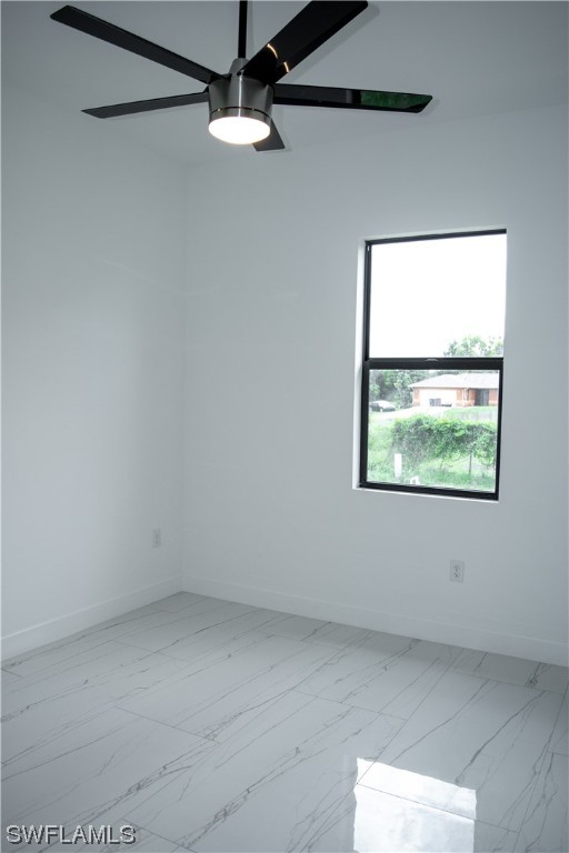 3718 41st Street Southwest Lehigh Acres, FL 33976 - Photo 15 of 28 an empty room with a window