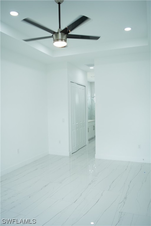 3718 41st Street Southwest Lehigh Acres, FL 33976 - Photo 20 of 28 a view of a chandelier fan in a room