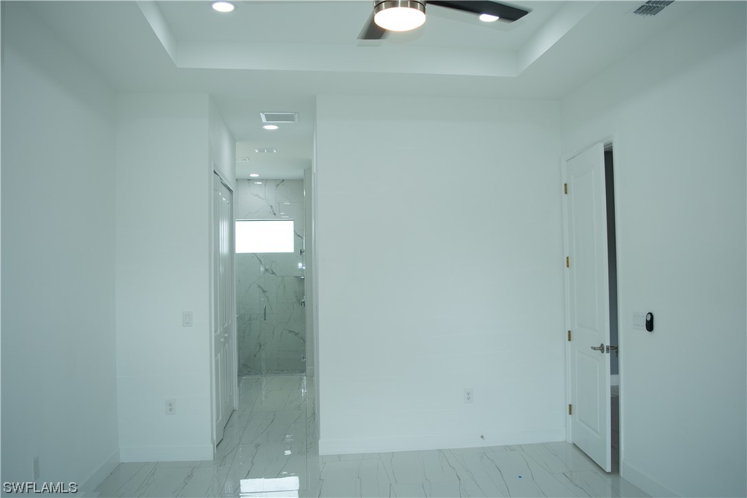 3718 41st Street Southwest Lehigh Acres, FL 33976 - Photo 21 of 28 a bathroom with a shower