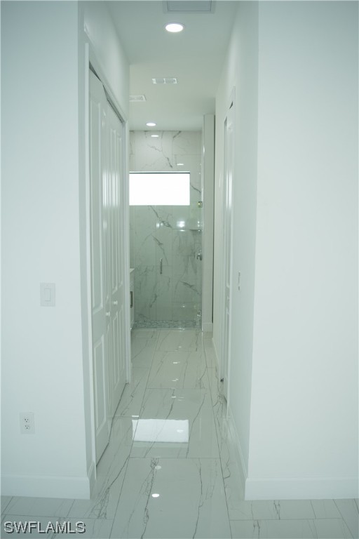 3718 41st Street Southwest Lehigh Acres, FL 33976 - Photo 23 of 28 a bathroom with a glass shower door