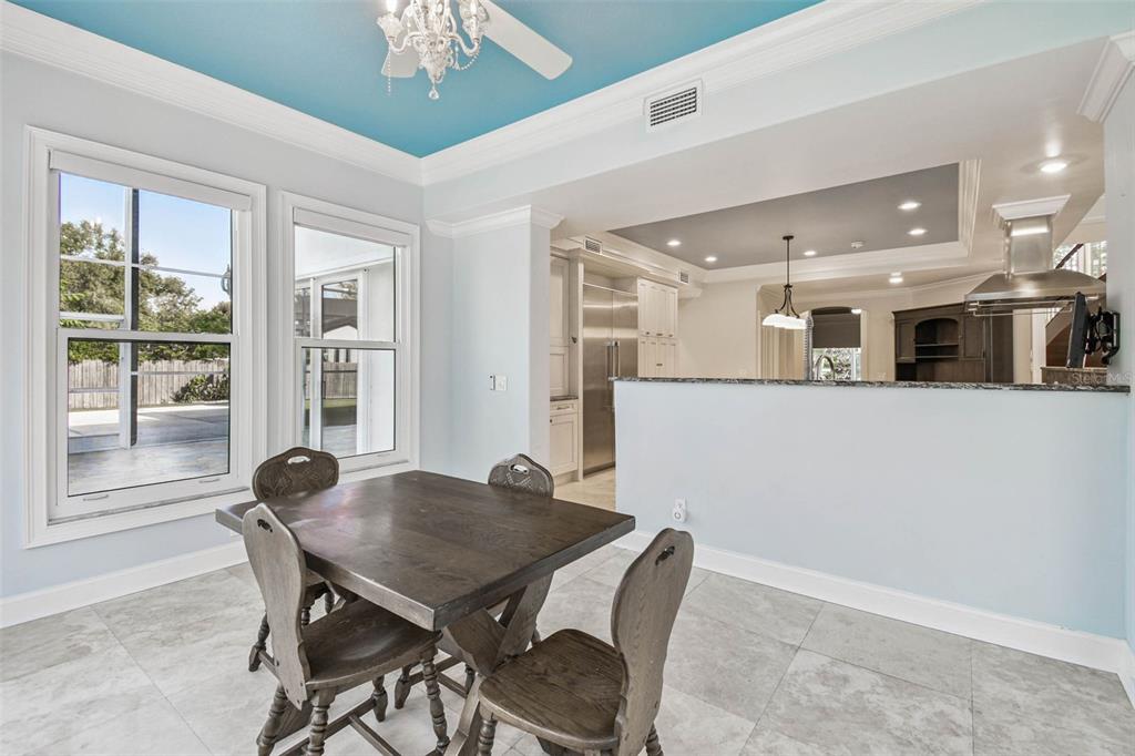 3505 Berger Road Lutz, FL 33548 - Photo 14 of 79 a view of a dining room with furniture and window