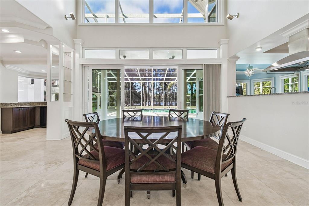 3505 Berger Road Lutz, FL 33548 - Photo 16 of 79 a view of a dining room with furniture window and outside view