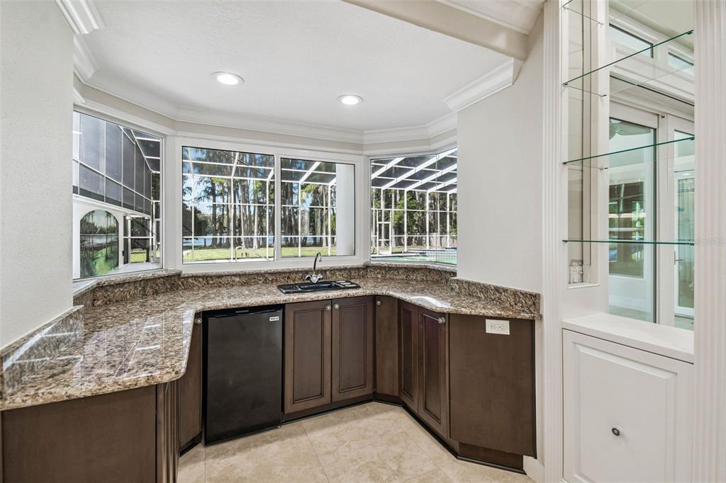 3505 Berger Road Lutz, FL 33548 - Photo 20 of 79 a kitchen with a sink and large window