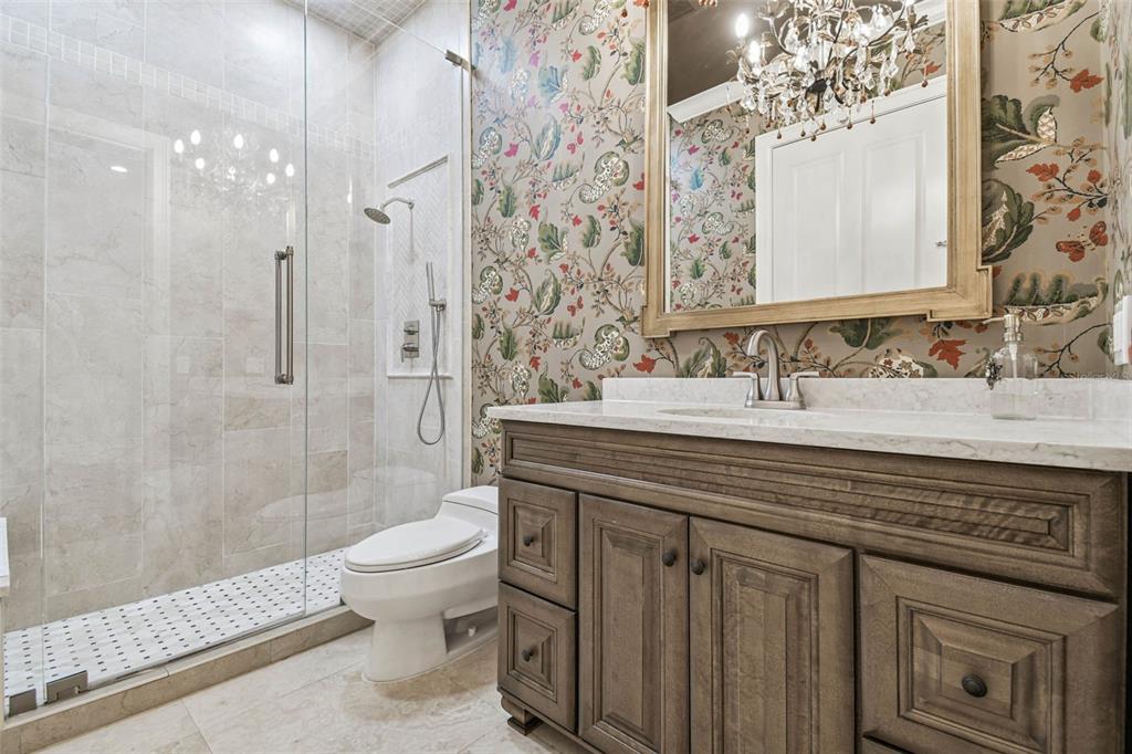 3505 Berger Road Lutz, FL 33548 - Photo 24 of 79 a bathroom with a sink toilet and shower