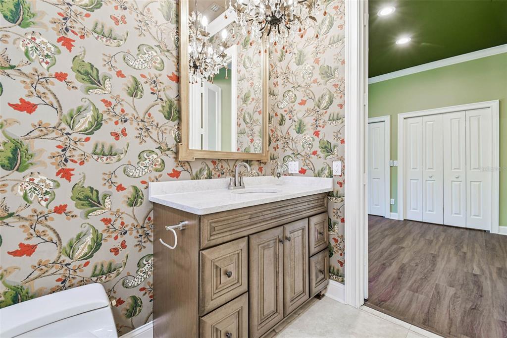 3505 Berger Road Lutz, FL 33548 - Photo 26 of 79 a bathroom with a sink and a mirror