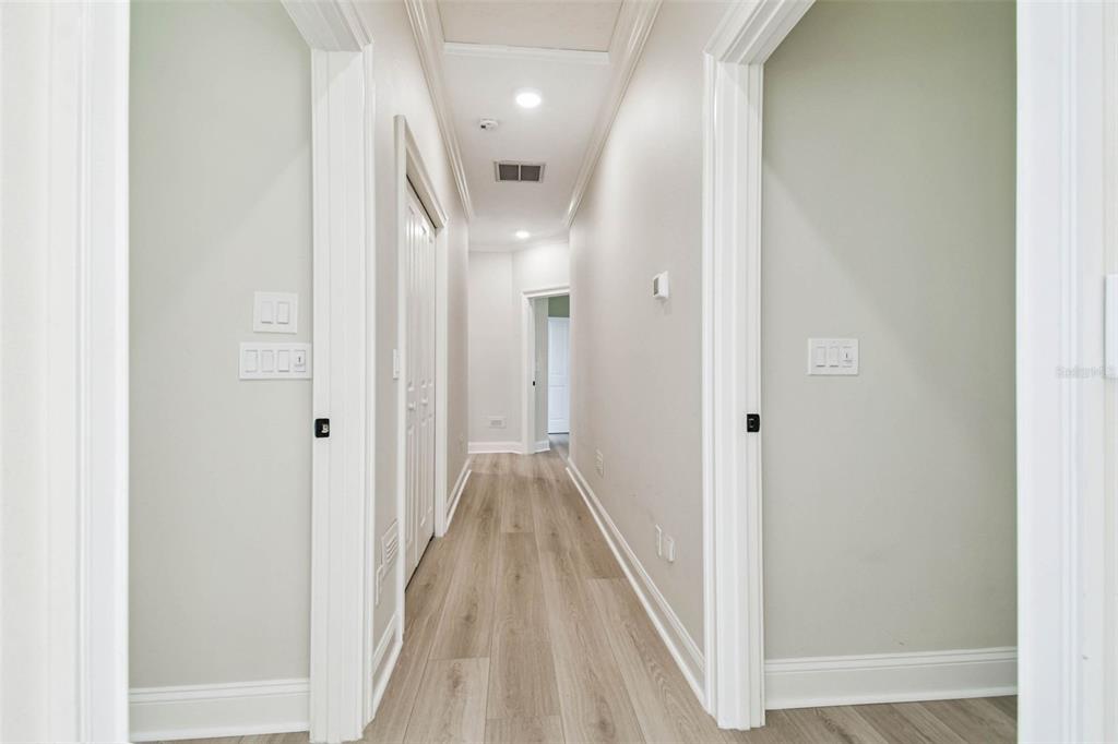 3505 Berger Road Lutz, FL 33548 - Photo 42 of 79 a view of a hallway with wooden floor