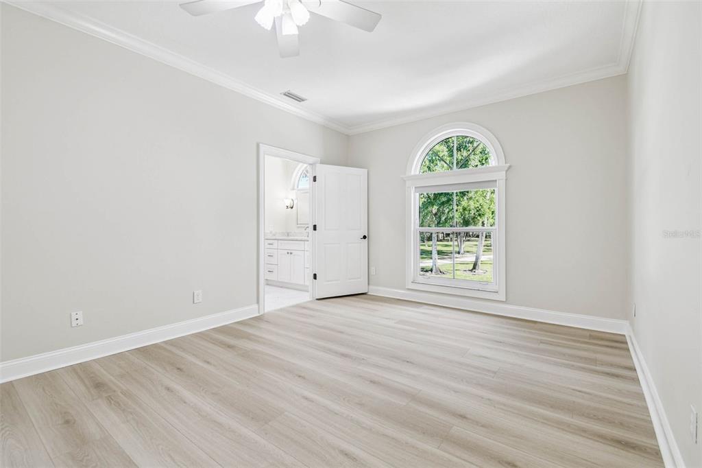 3505 Berger Road Lutz, FL 33548 - Photo 43 of 79 wooden floor in an empty room with a window